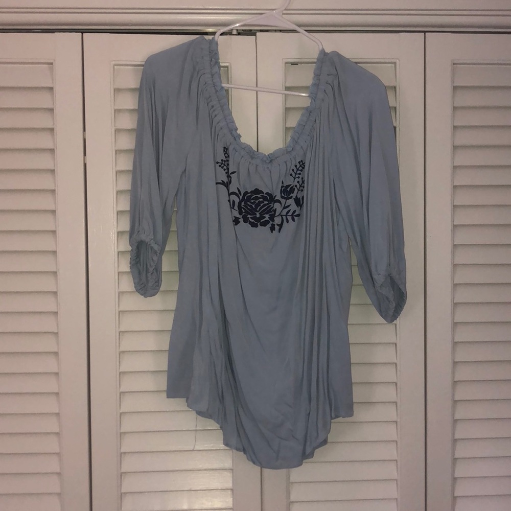 Off the shoulder blue shirt